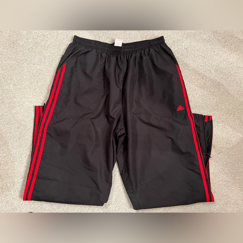Men’s 2XL black and red Adidas athletic pants with zippered bottoms